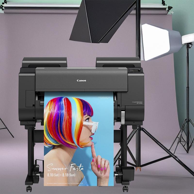 An empty photographic studio, with no people present. The studio is equipped with professional photography gear like tripods, lighting equipment, soft
