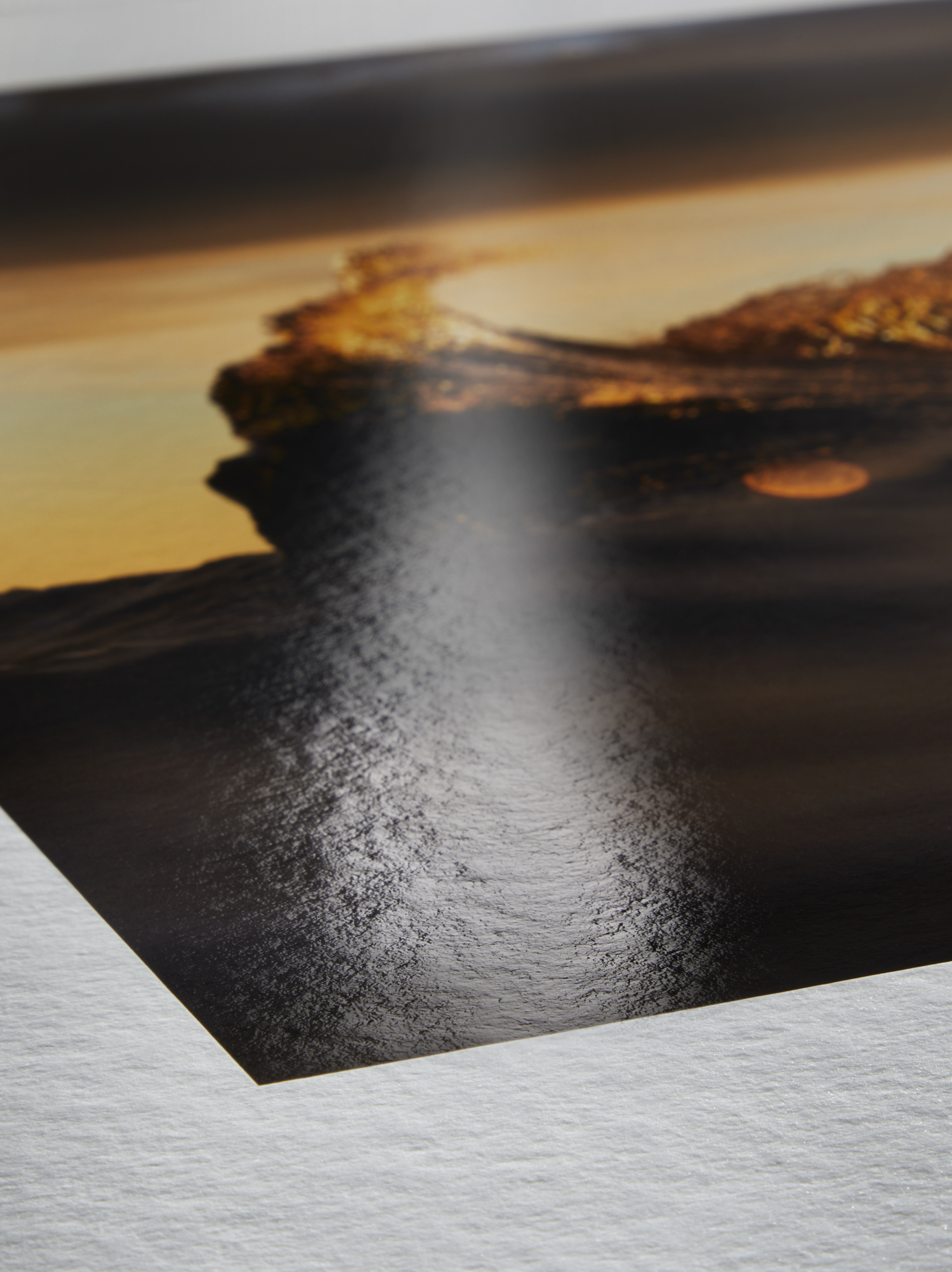 Close-up detail of Hahnemühle Bamboo Gloss Baryta paper surface showing gloss baryta texture